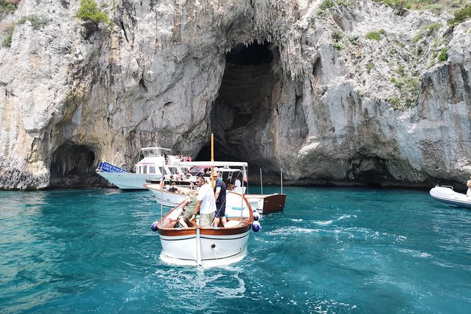 Capri Boat Tour from Naples – Small Group, Swim & Relax - Capri time on your own: Piazzetta, shopping, and lunch strategy