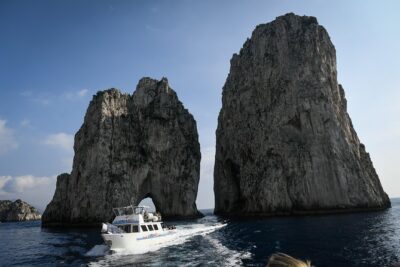 Capri Mini Cruise and City Sightseeing Day Trip from Naples - The Mini Cruise Around Capri: Grottos, Arches, and Cliff Icons