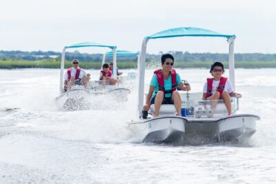 Drive your Own 2 Seat Fun Go Cat Boat on Marco Island - The private island stop: shelling and a water break
