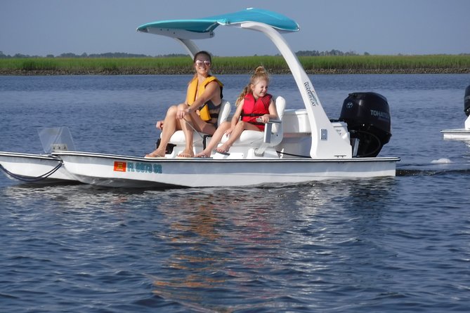 Drive your Own 2 Seat Fun Go Cat Boat on Marco Island - Speed, comfort, and safety: fun with guardrails