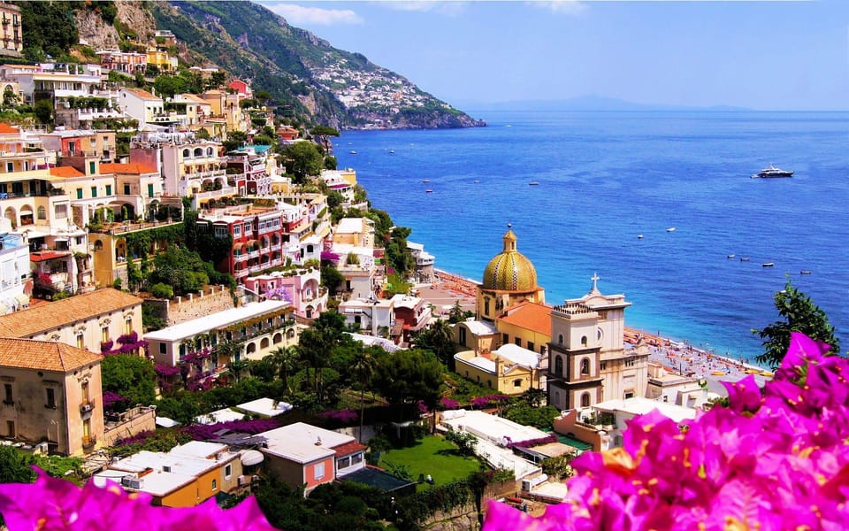 From Naples: Exclusive Tour of Amalfi Coast - Amalfi by the sea: cathedral stop, street food options, and historic corners