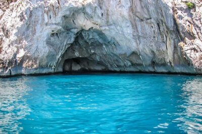 From Naples: Full-Day Capri Island and Blue Grotto Tour - Capri with a guide: Port views, upscale streets, and how the 4 hours play out