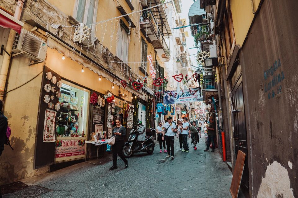 Naples: Royal Palace and Monumental Area Small Group Tour - Piazza Municipio and Castel Nuovo: the city’s power shows up early