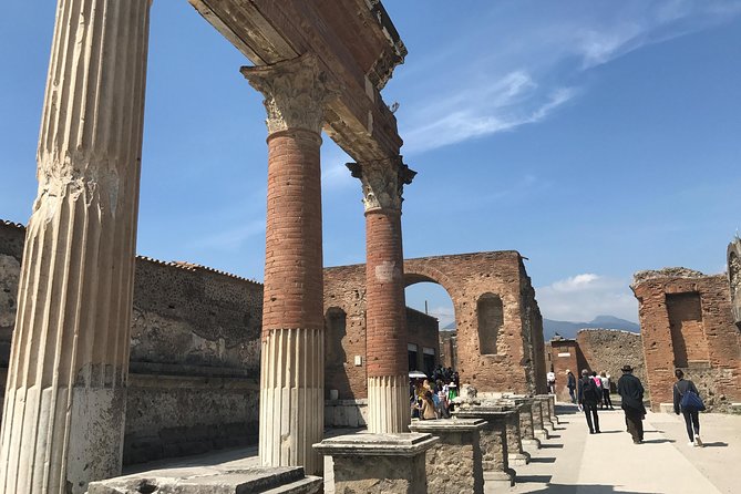 Pompeii Guided Group Tour with Entry Ticket and Archaeologist - Casa dei Vettii: Roman art, a buried home, and a room with erotic paintings