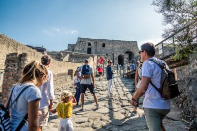 Skip-the-Line Pompeii & Mt. Vesuvius Day Trip from Naples - Via dell’Abbondanza, Stabian Baths, and the messy reality of street life